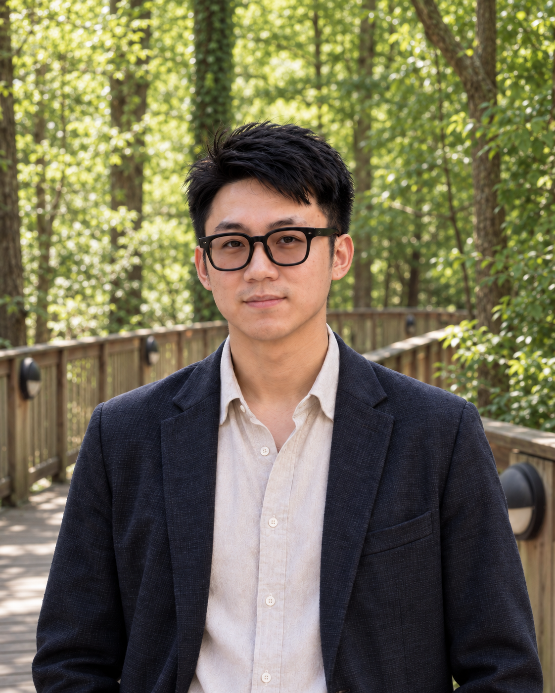 Boyang Li with a wooded William & Mary campus background